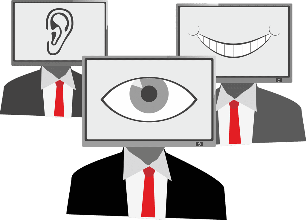 Silhouetten von Männern in Anzügen mit Computerbildschirmen als Köpfe, auf denen Augen, Ohren und Münder zu sehen sind