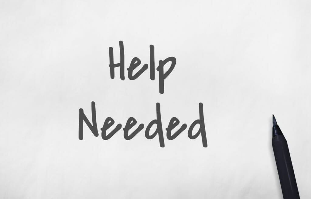 help needed written in pen