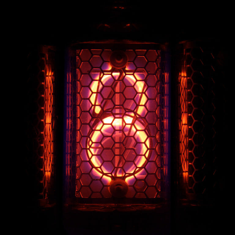 Neon number 8 glowing red with hexagonal gate over top